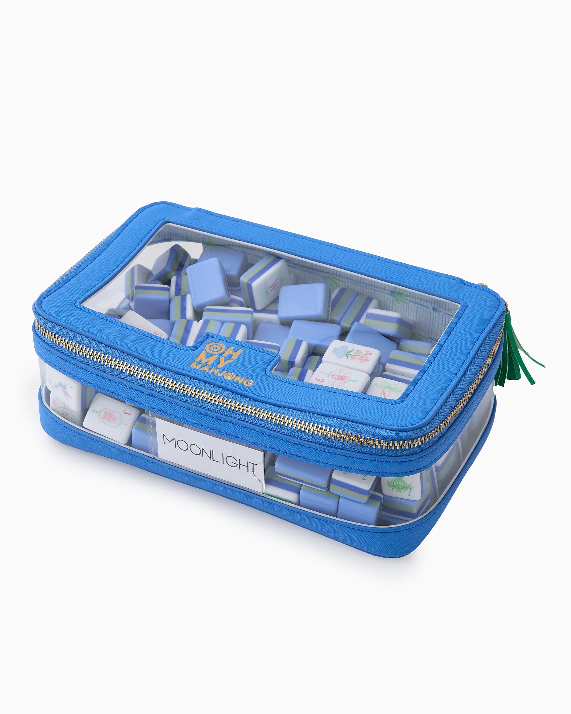 Oh My Mahjong stacking tile storage bag in blue with palm pattern interior with tasseled zipper, with moonlight mahjong tiles
