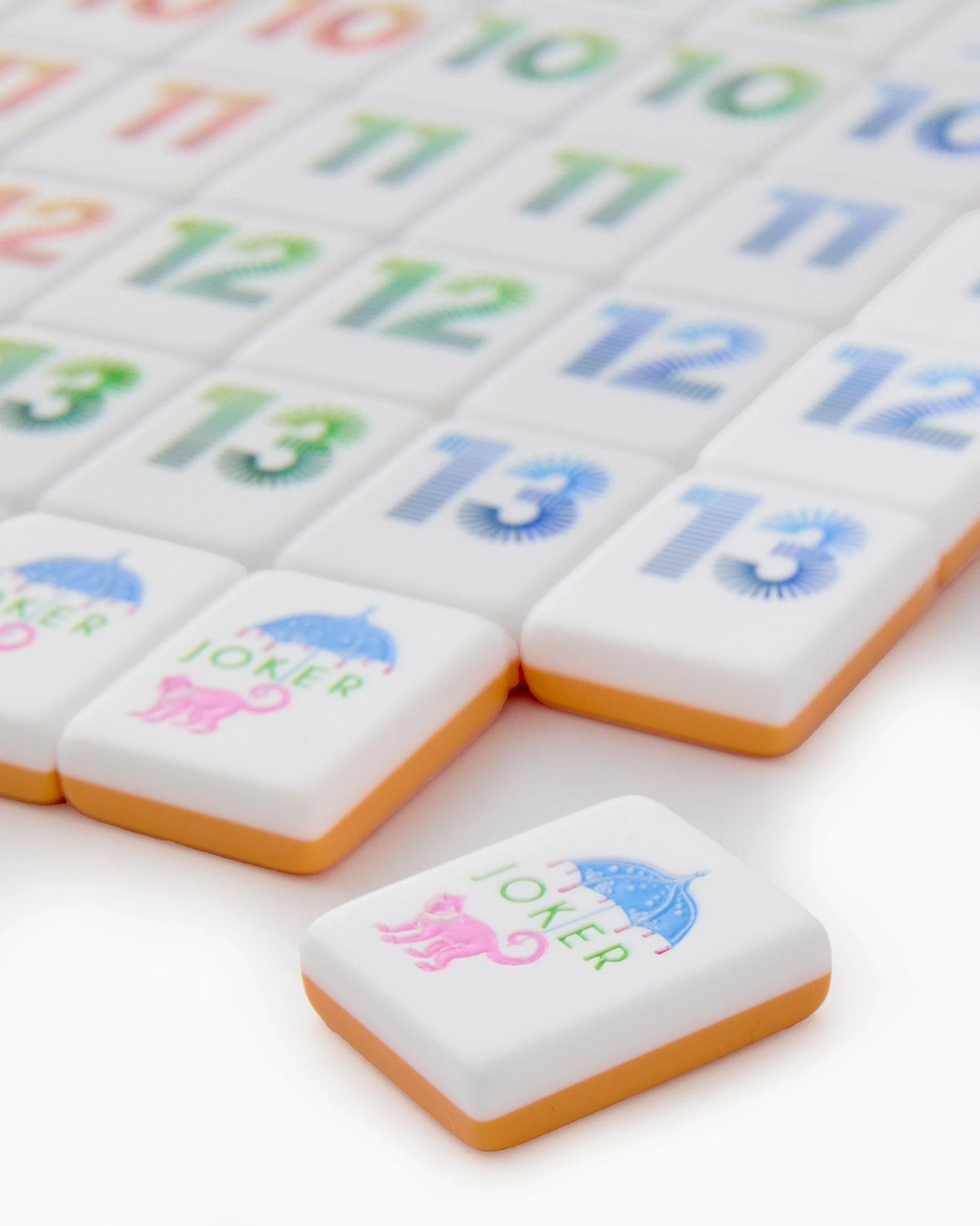 Oh My Mahjong Orange Rummi tile set close up with monkey joker