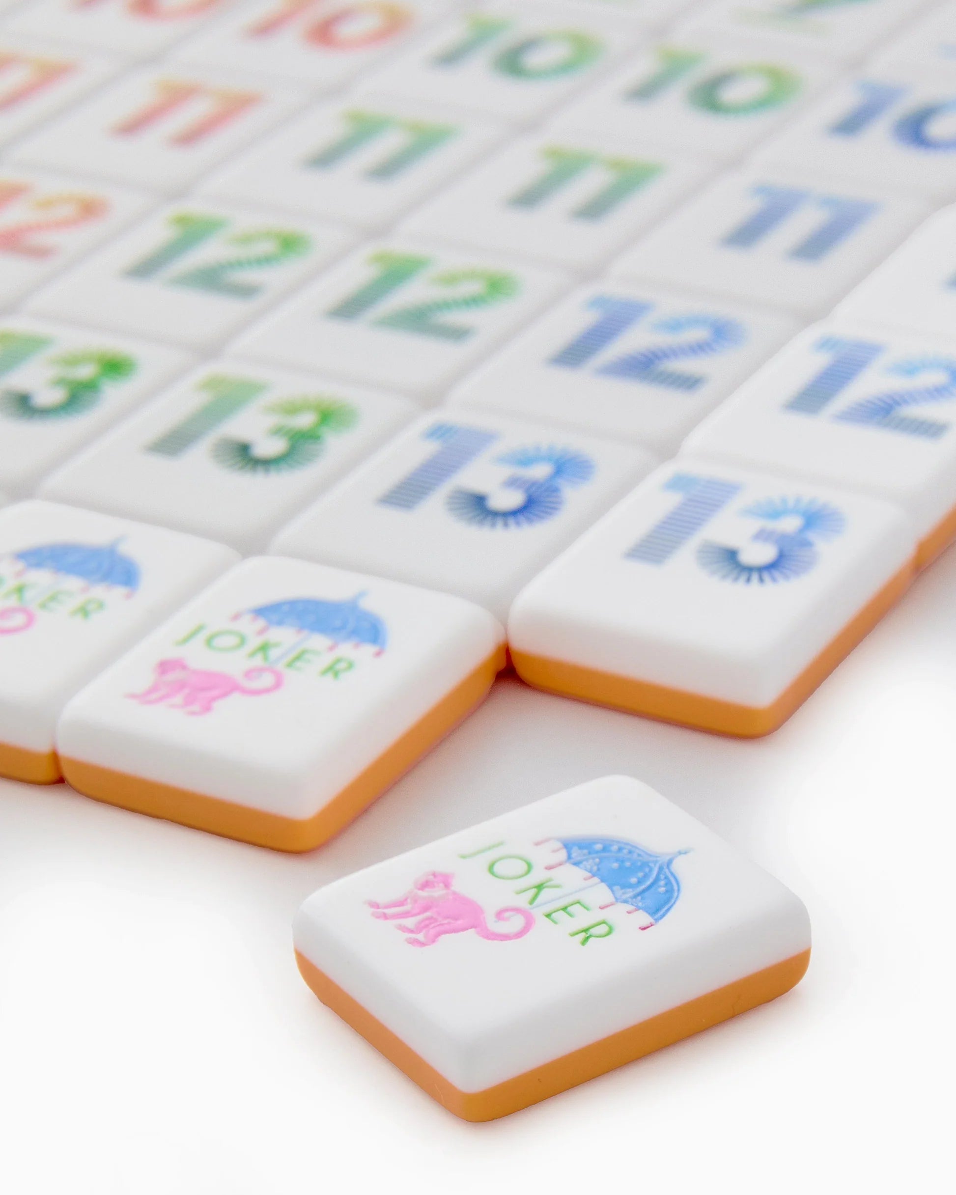 Oh My Mahjong Orange Rummi tile set close up with monkey joker