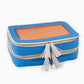 Oh My Mahjong Orange Rummi tile set in storage bag with tasseled zipper