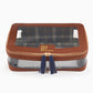 Oh My Mahjong stacking tile storage bag in cognac brown with plaid interior that coordinates with Astor Mat, with blue tasseled zipper.