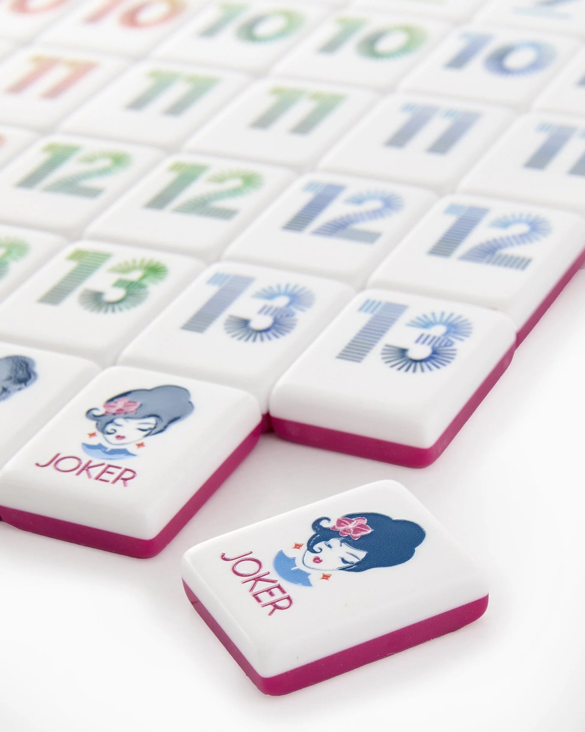 Oh My Mahjong Orange Rummi tile set close up view of Lola Joker tile