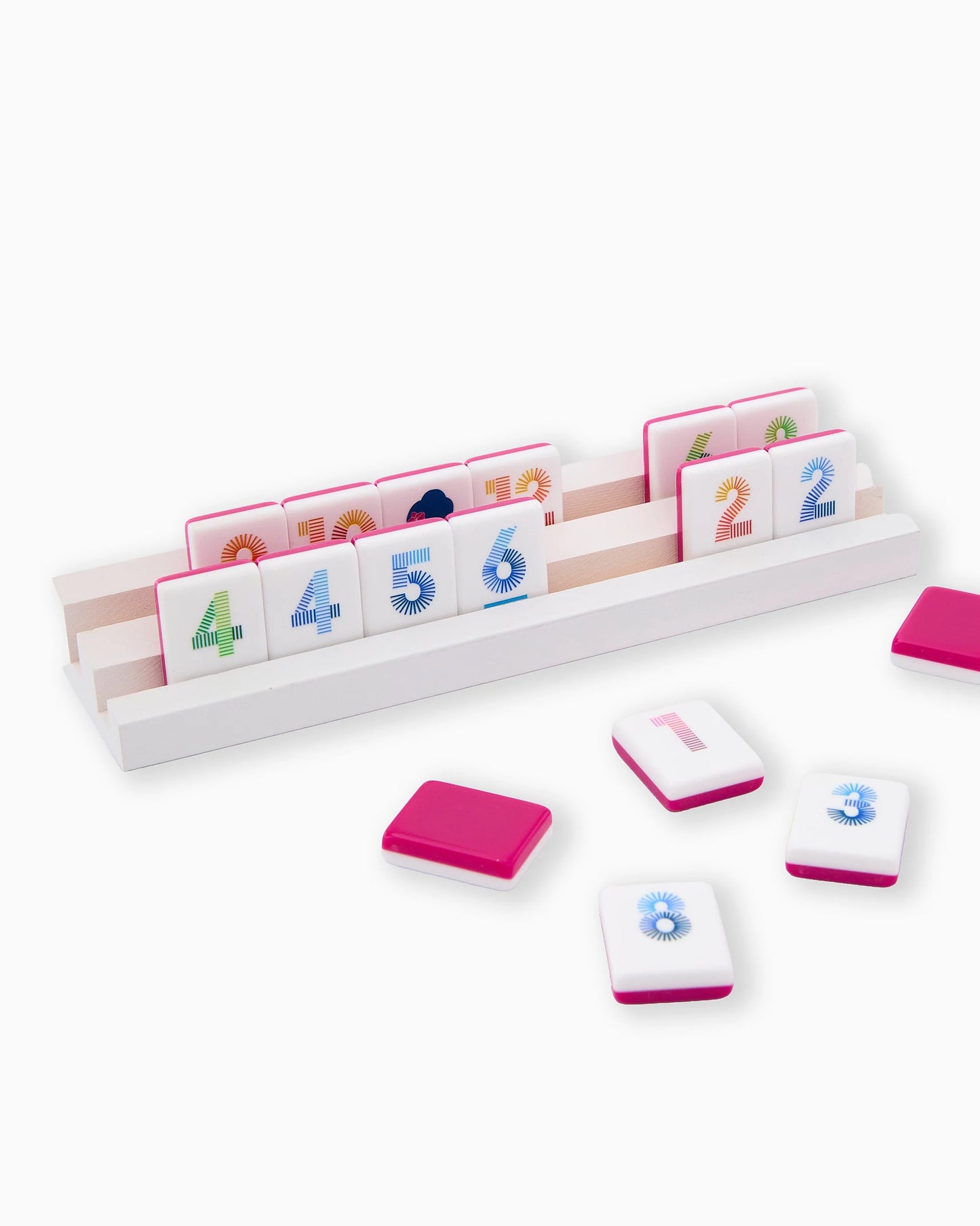 Oh My Mahjong Pink Rummi tile set on white wooden racks