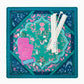 Oh My Mahjong Esme  instructional mahjong mat in emerald green, teal, navy blue floral and animal print pattern with mahjong accessories, racks, shuffler, line finder and emerald mahjong tiles