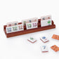 Oh My Mahjong Heritage Rummi tile set on stained wooden racks