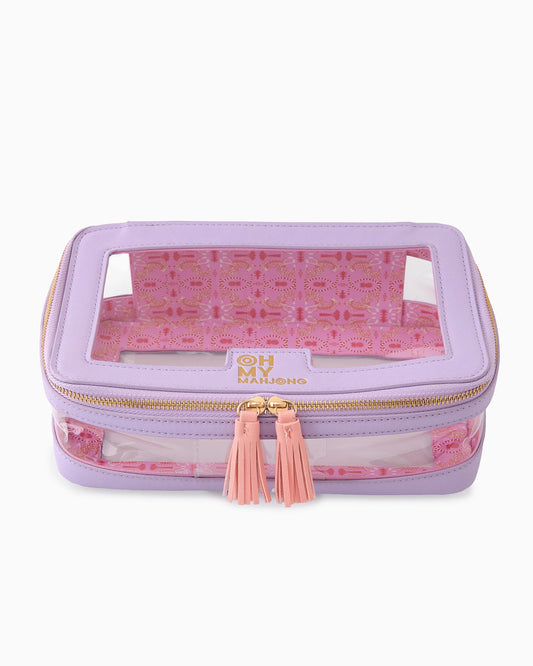 Oh My Mahjong stacking tile storage bag in lavender with cheetah pattern interior with tasseled zipper.