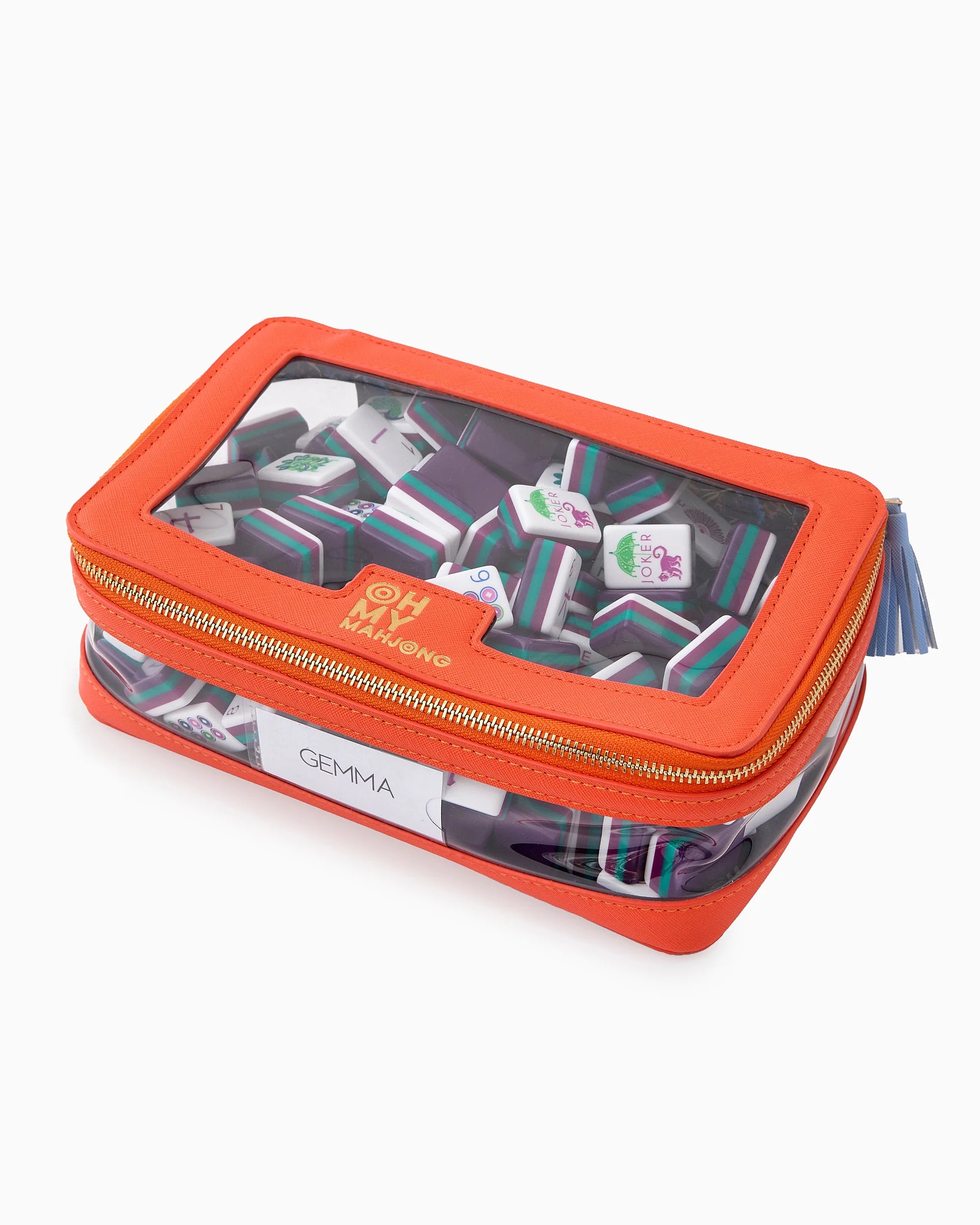 Oh My Mahjong stacking tile storage bag in orange with floral pattern interior with tasseled zipper with Gemma mahjong tiles