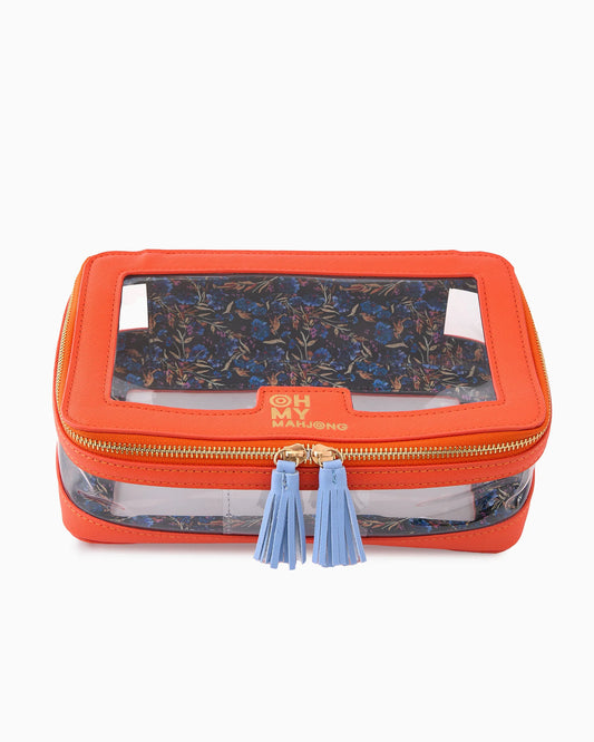 Oh My Mahjong stacking tile storage bag in orange with floral pattern interior with tasseled zipper